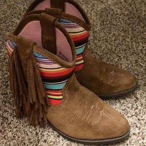 Ariat fringed cowgirl boots.